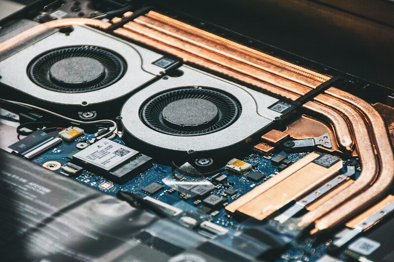 Close-up of computer cooling fans and heat pipes